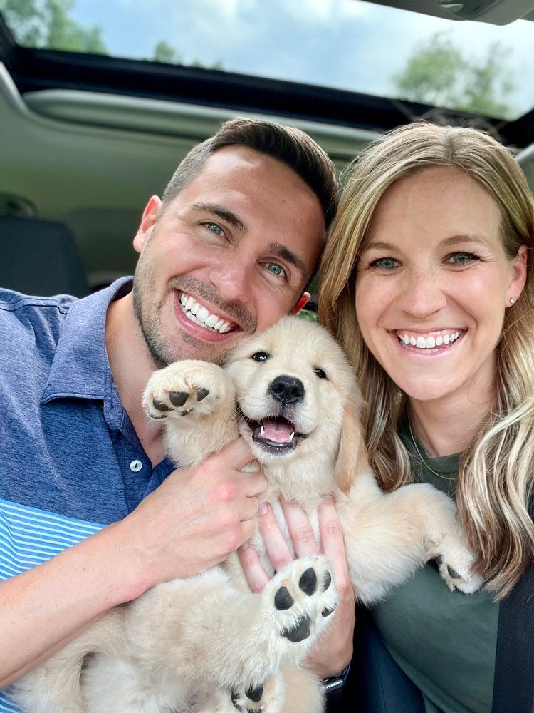 Olivia and her Golden Retriever companion
