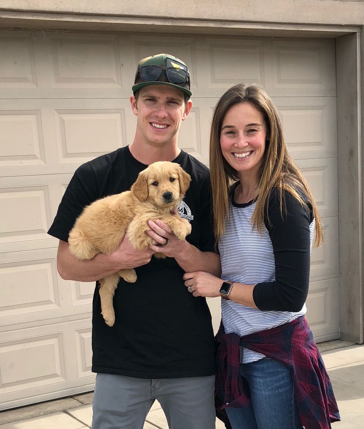 Dasia with her Golden Retriever puppy