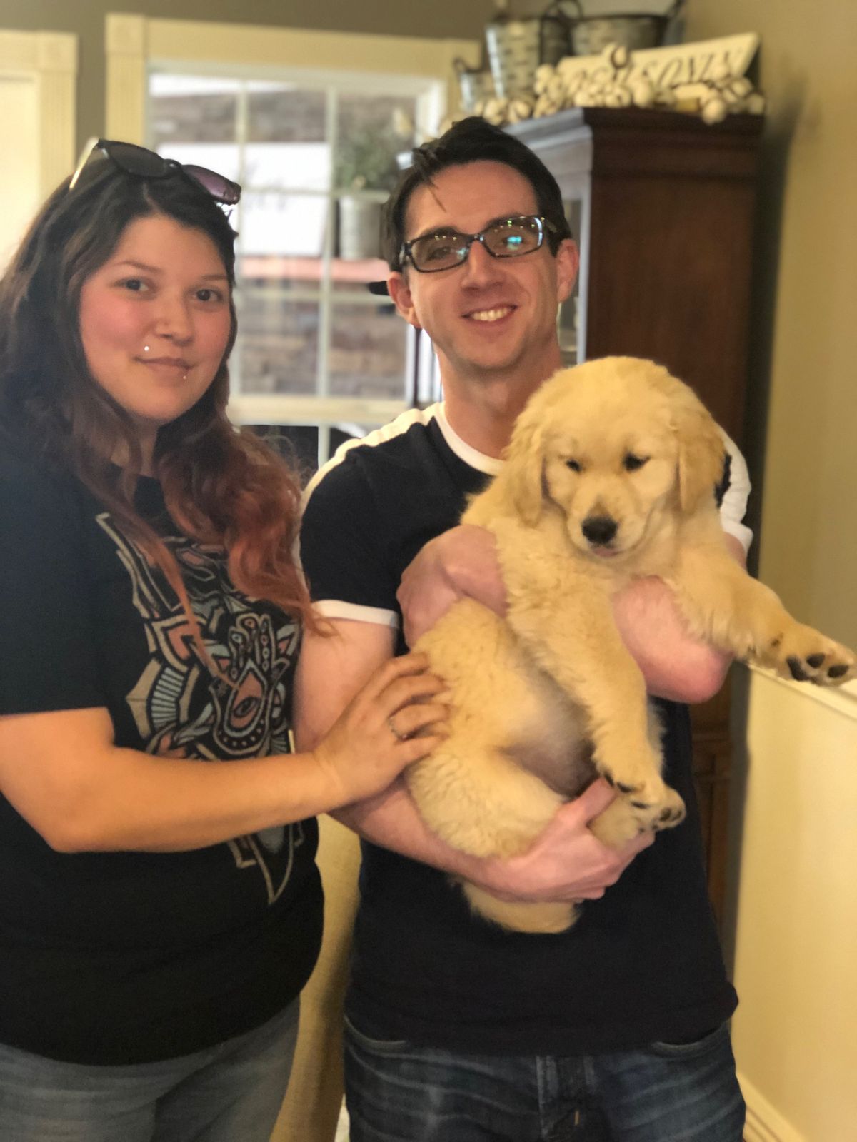 Melanie and family enjoying time with their dog